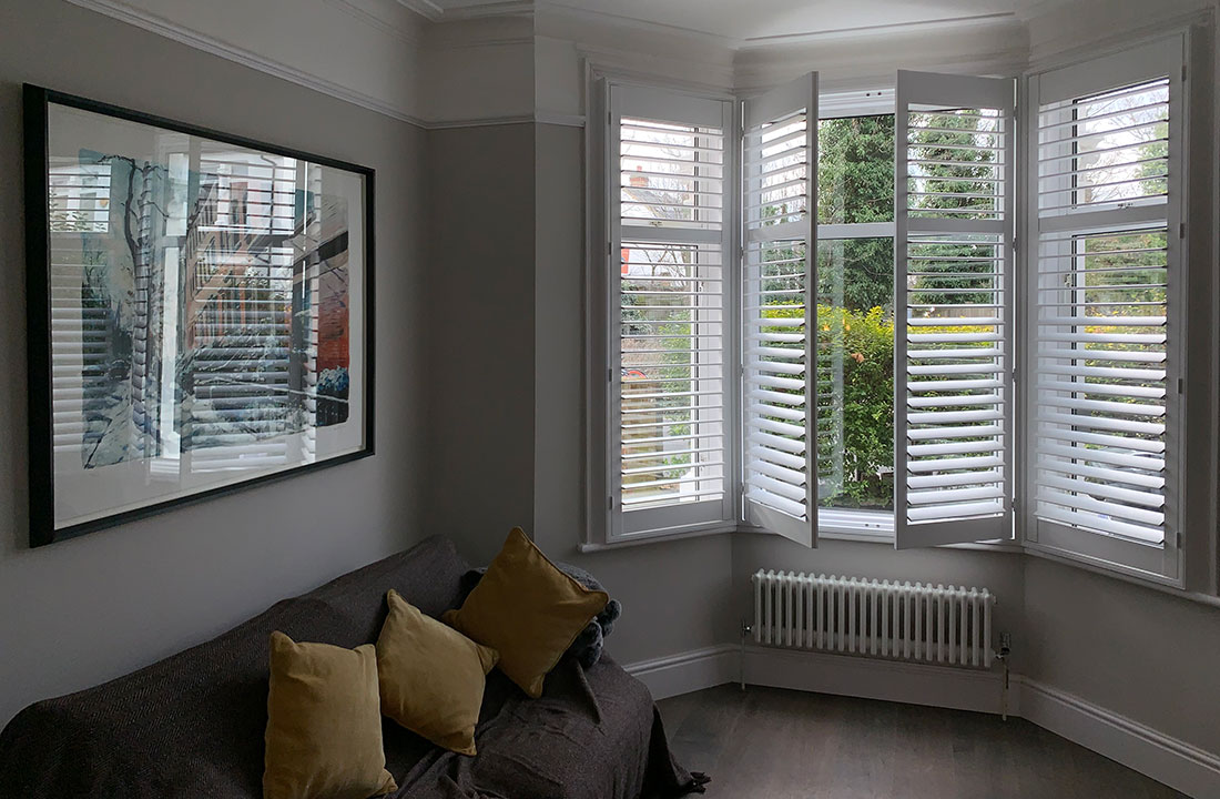 Full height shutters in a living room